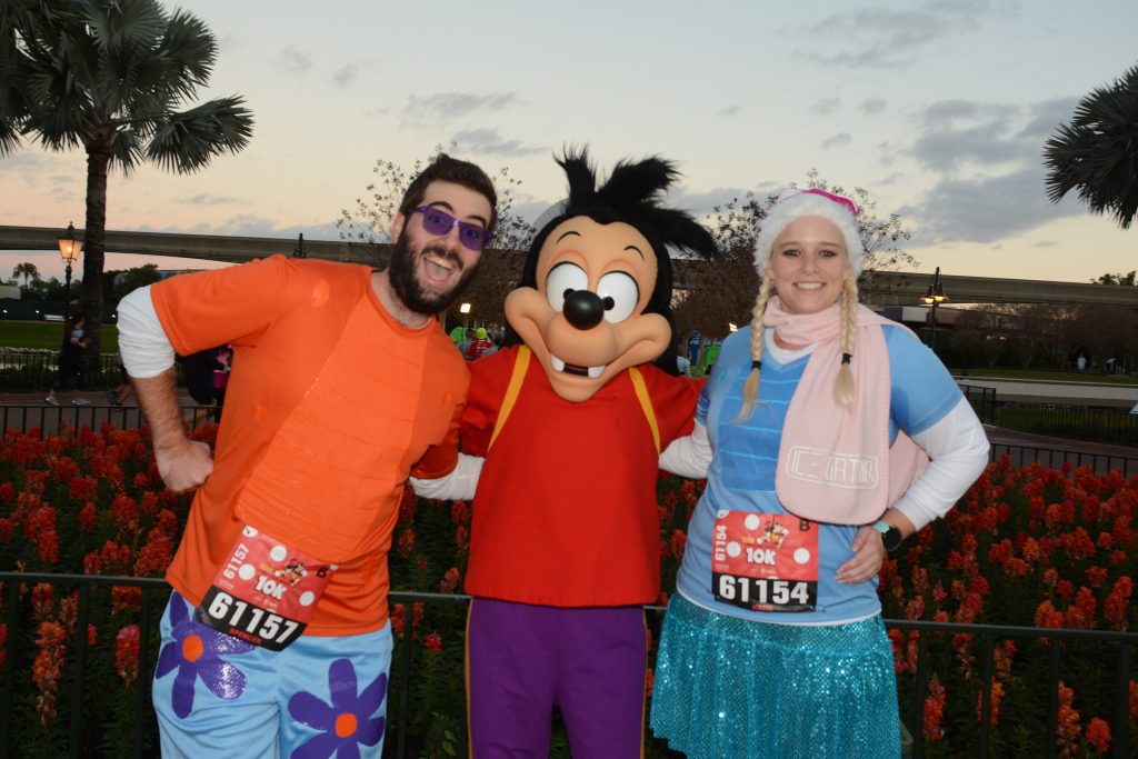 Katie and Spencer meet Goofy's son Max while dressed as Ice Gator and Lagoona Gator from Disney's Water Parks.