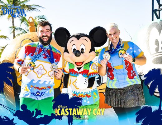Mickey Mouse posing with Spencer and Katie on Castaway Cay