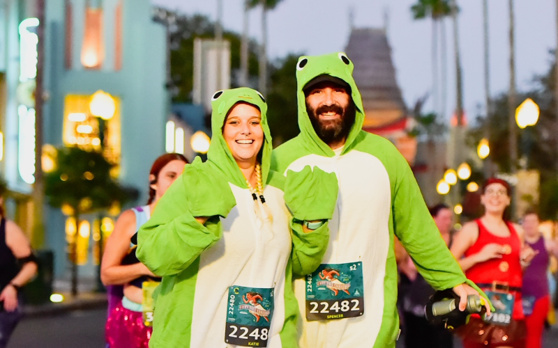 Katie and Spencer in from costumes running in Hollywood Studios